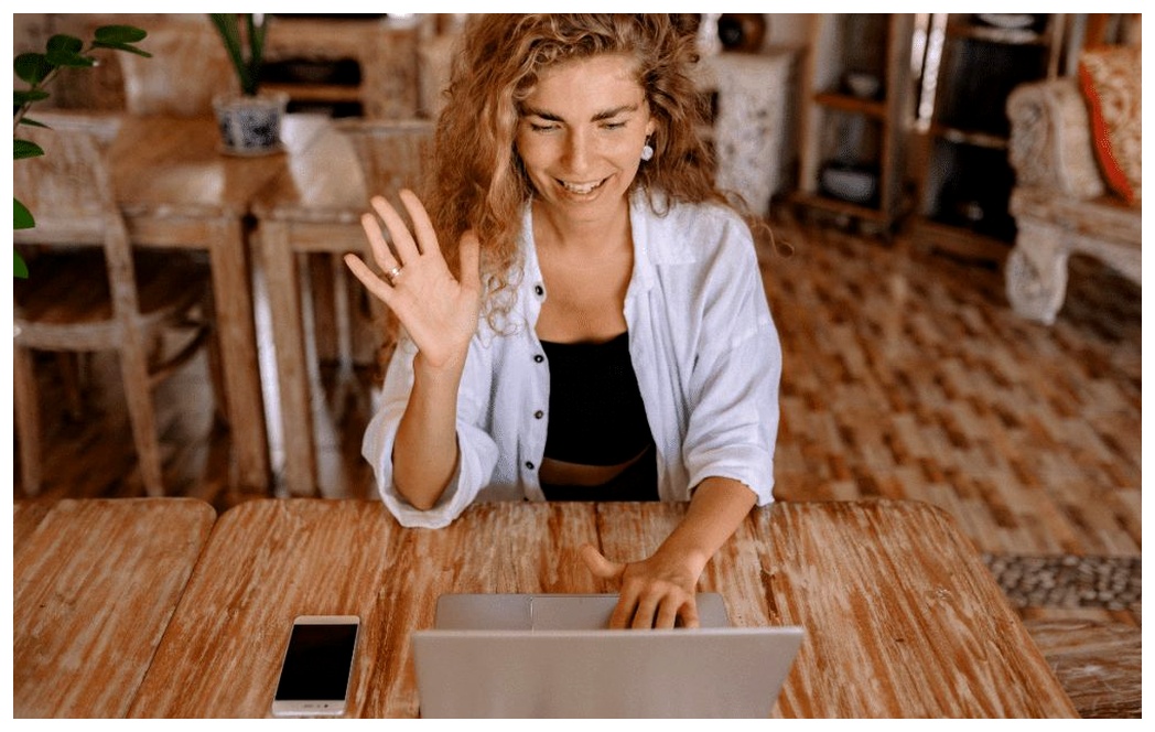 Lady taking an online language class with a tutor