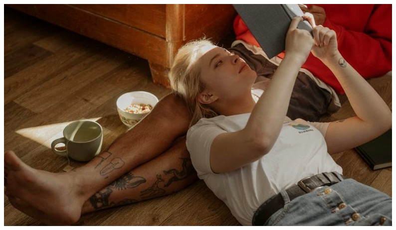 Couple reading books together