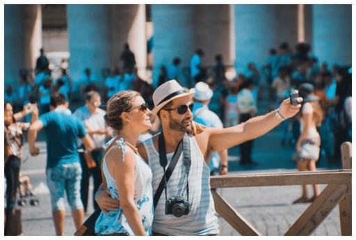tourists greeting someone
